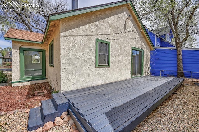3 S 8th St, Colorado Springs, CO 80905 - back of house featuring stucco siding and a deck