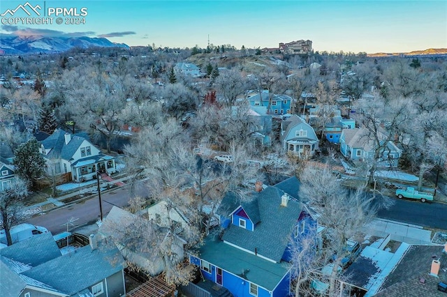 drone / aerial view featuring a mountain view