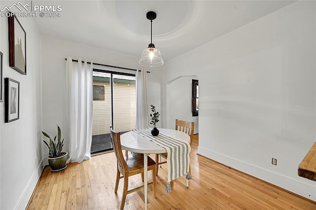 3 S 8th St, Colorado Springs, CO 80905 - dining space with light wood-style flooring and baseboards