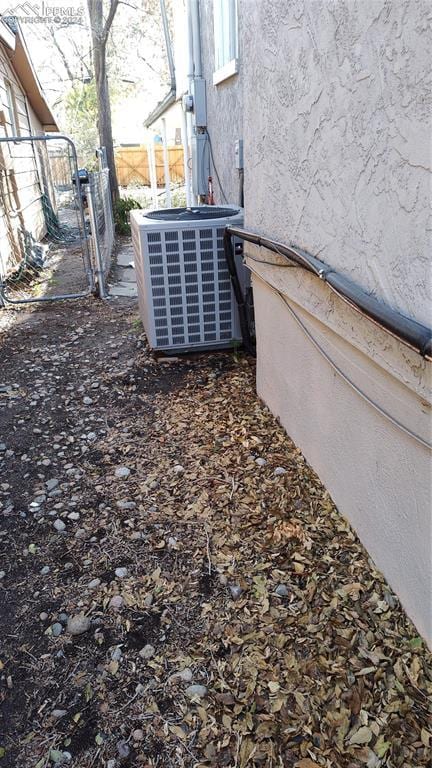 206 W Arroyo Ave, Pueblo, CO 81004 - details with central air condition unit and stucco siding