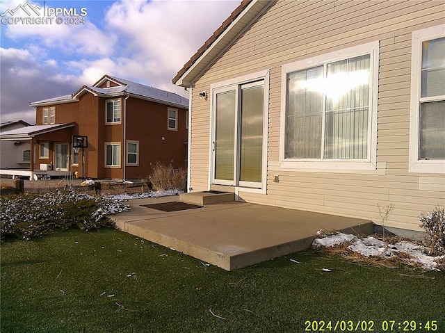 exterior space with a yard and a patio