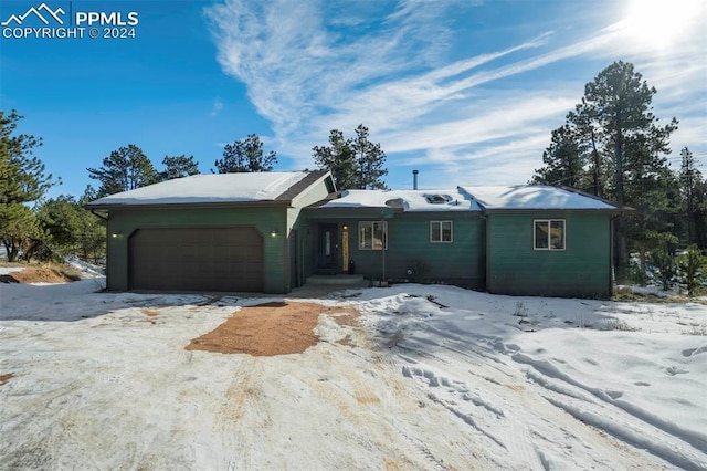 single story home with a garage