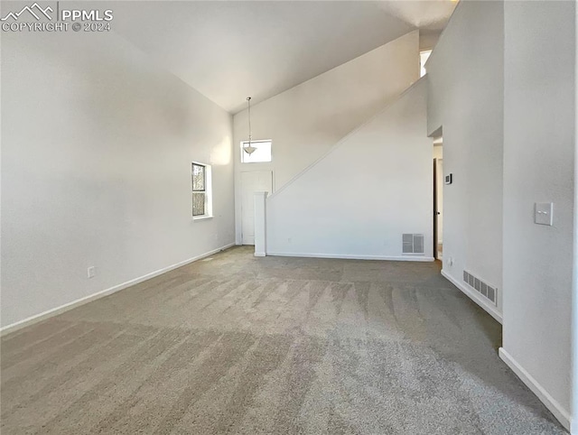 interior space with high vaulted ceiling