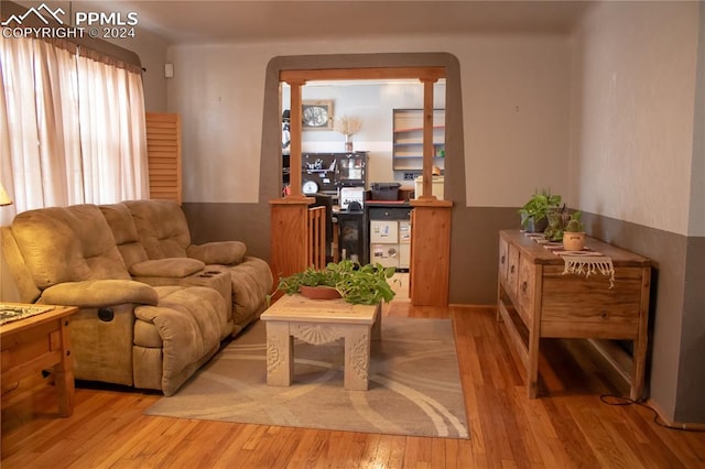 living area with light hardwood / wood-style flooring