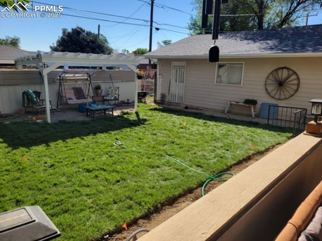 view of yard featuring a patio and a pergola