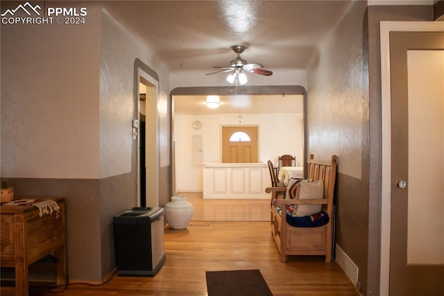 hall with light hardwood / wood-style floors