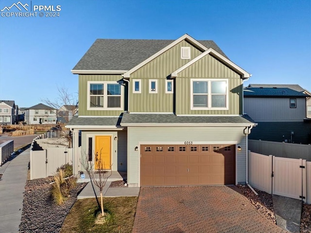 view of front of home with a garage