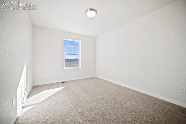 view of carpeted spare room