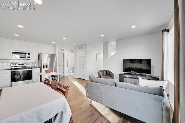 living room featuring light wood-type flooring