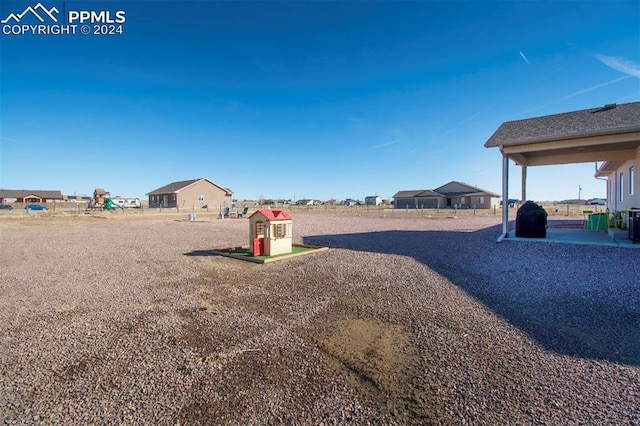 view of yard with a playground