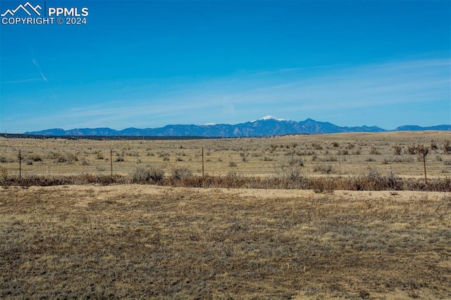 mountain view featuring a rural view