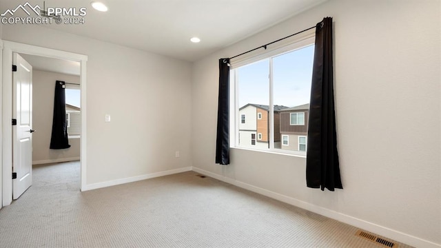 view of carpeted spare room