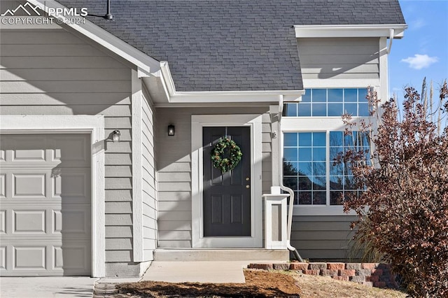 entrance to property with a garage