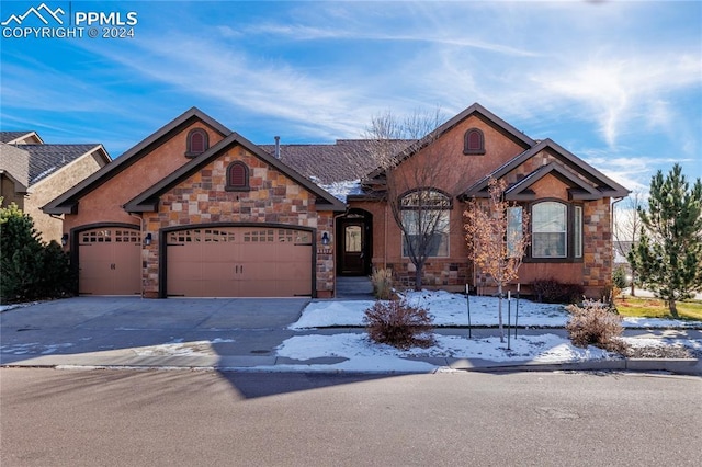 view of front of property featuring a garage