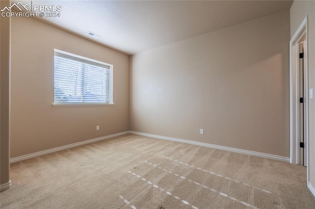 view of carpeted spare room