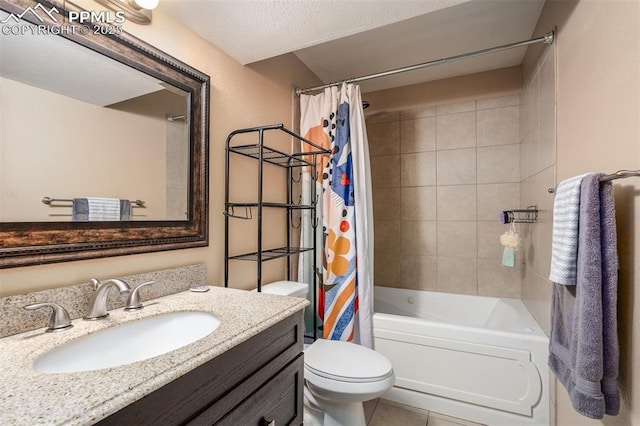 full bathroom with shower / bath combo, tile patterned flooring, a textured ceiling, toilet, and vanity