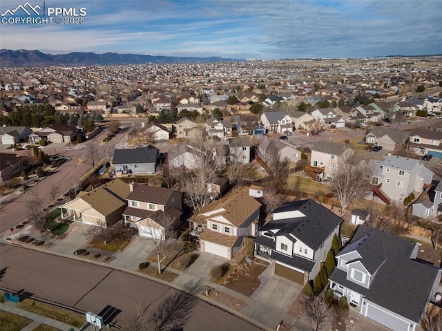 drone / aerial view featuring a mountain view