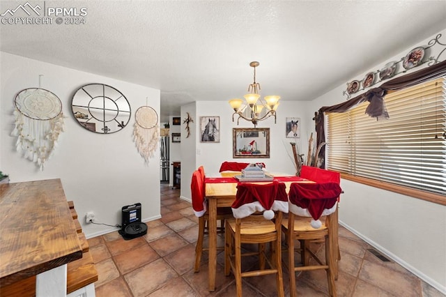 dining room featuring an inviting chandelier