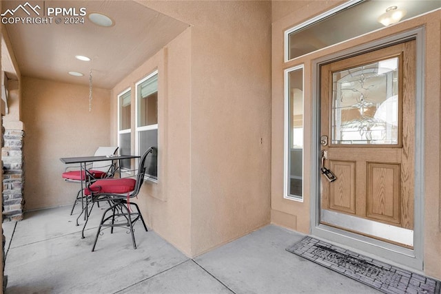 property entrance featuring covered porch