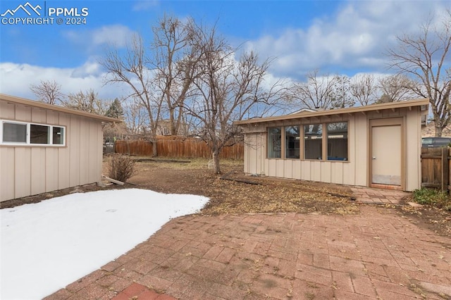 view of yard with a patio area and an outdoor structure