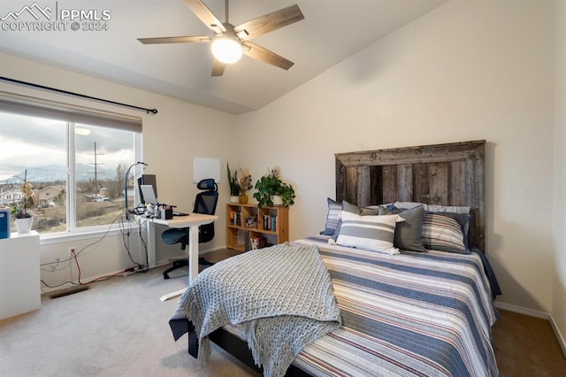 carpeted bedroom featuring ceiling fan and lofted ceiling