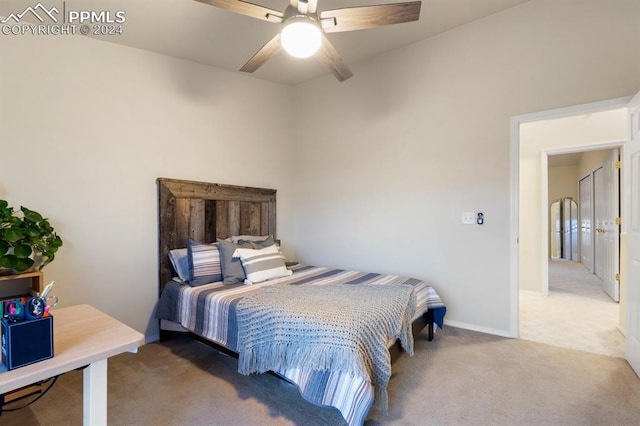 carpeted bedroom with ceiling fan