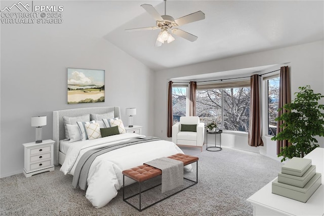 carpeted bedroom featuring vaulted ceiling and ceiling fan