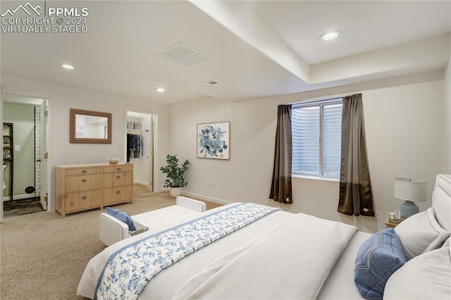 bedroom with light colored carpet