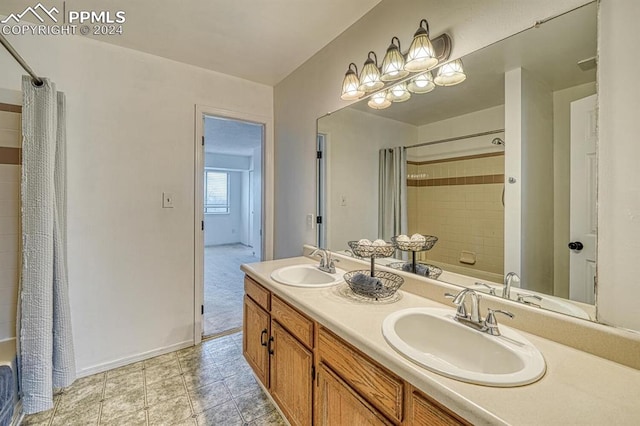 bathroom featuring tile patterned flooring, shower / bath combo, and vanity