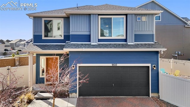 view of front of property featuring a garage