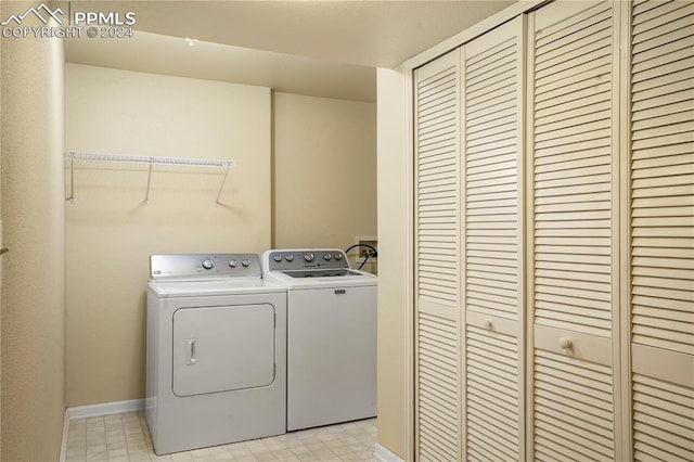 laundry room with washer and dryer