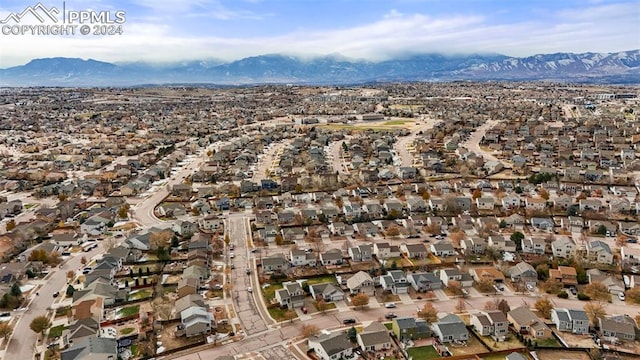 drone / aerial view featuring a mountain view