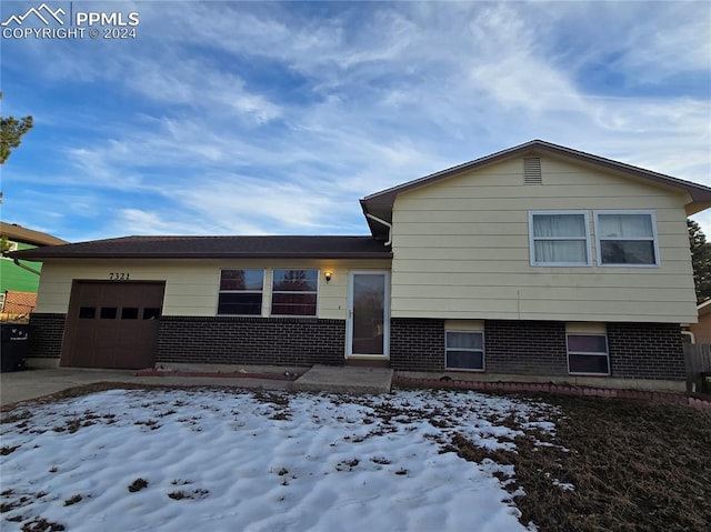 tri-level home with a garage