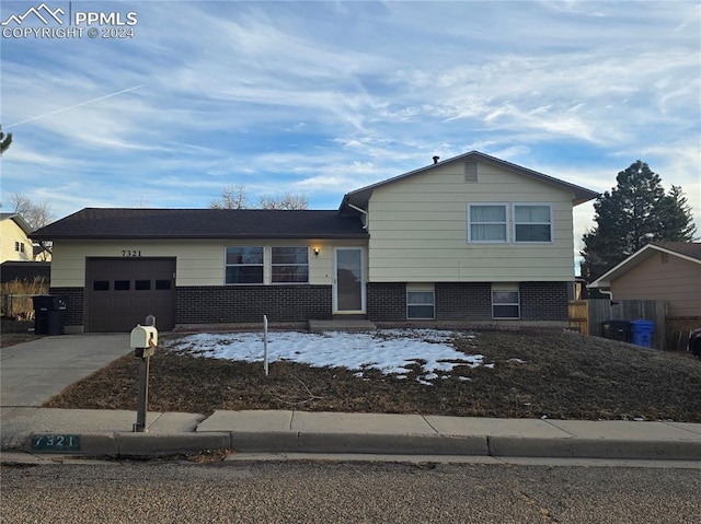 tri-level home featuring a garage