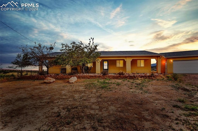 view of front of house with a garage