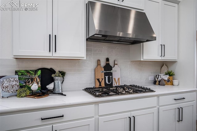 kitchen with white cabinets and stainless steel gas stovetop