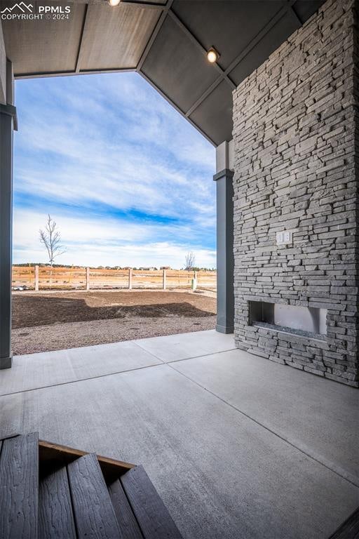 view of patio with a rural view