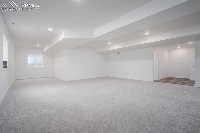 basement with carpet flooring