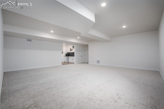 basement featuring carpet