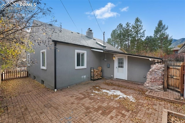 back of house featuring a patio