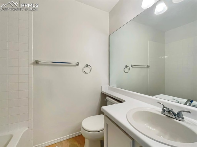 full bathroom with vanity, toilet, and shower / tub combination