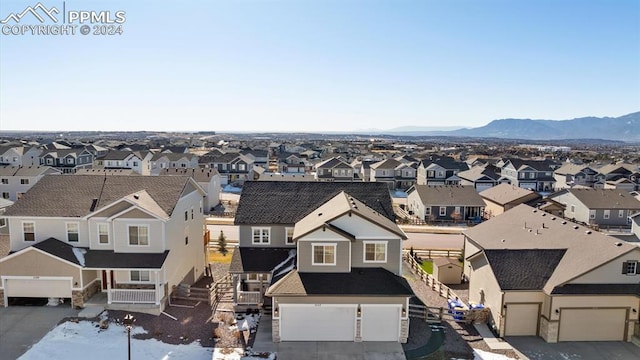 drone / aerial view featuring a mountain view