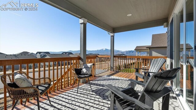 deck with a mountain view