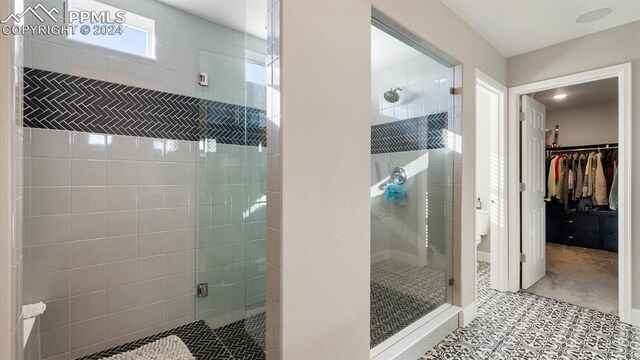 bathroom with an enclosed shower