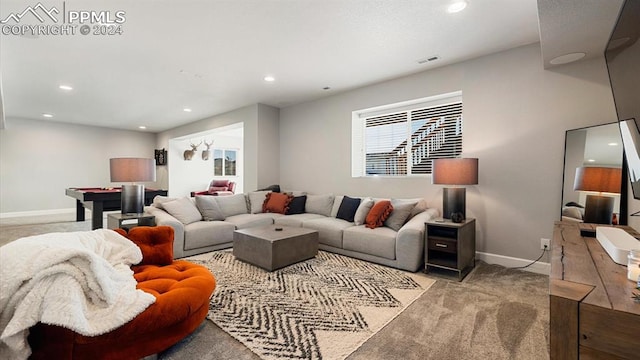 carpeted living room with billiards