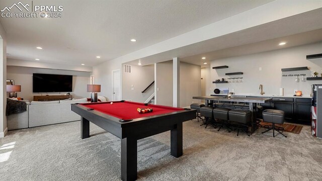 game room with light colored carpet and pool table