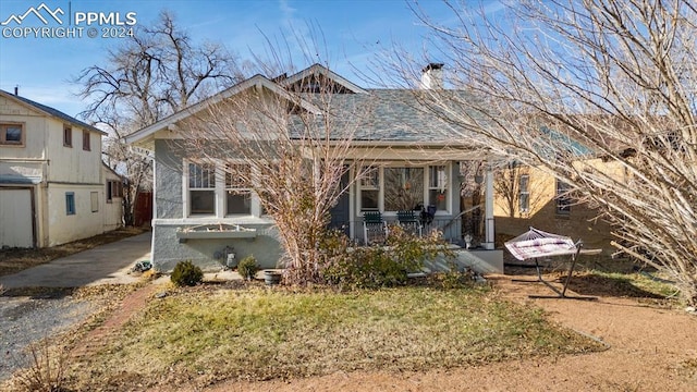 bungalow-style home with a porch