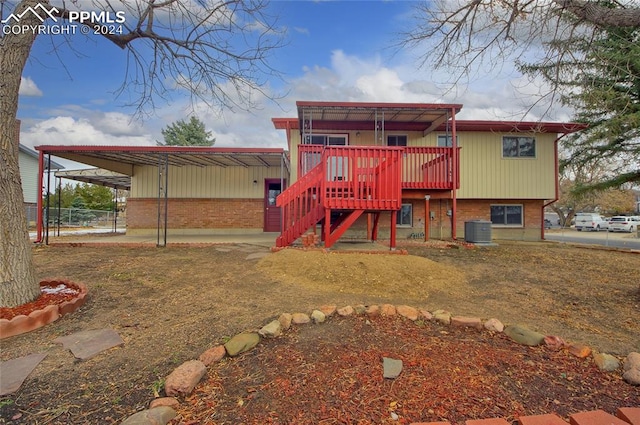 back of property with central AC unit