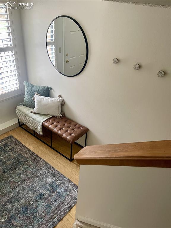 sitting room featuring hardwood / wood-style flooring