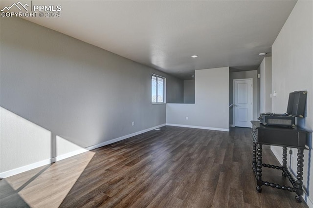 living room featuring dark hardwood / wood-style flooring